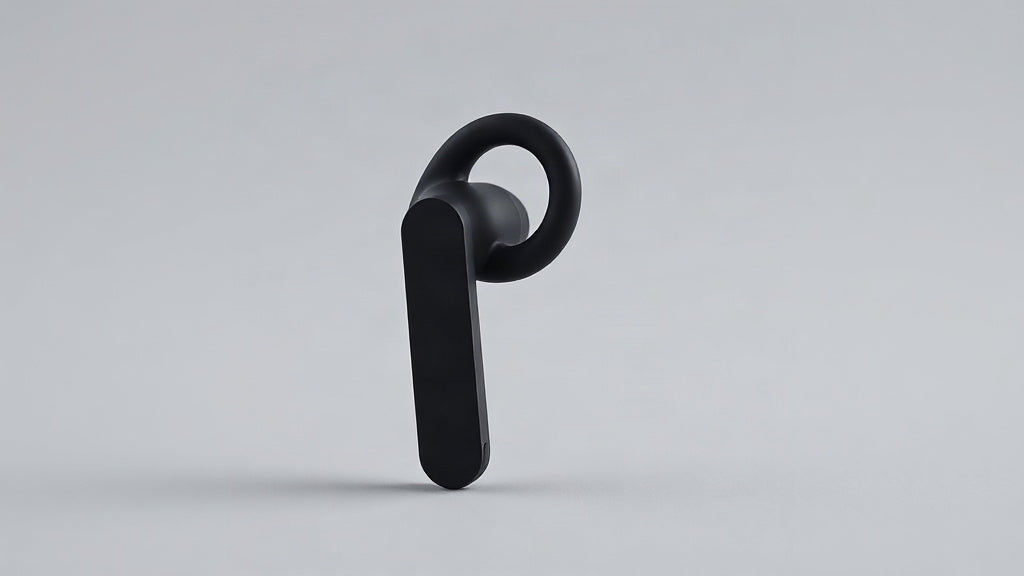 Open-ear wireless earbuds with a soft silicone ear hook on a plain studio background